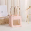 Kraft paper with an open smiling face, creative cartoon kraft paper bag, shopping clothing, kraft paper handbag, gift packaging Application Scenario